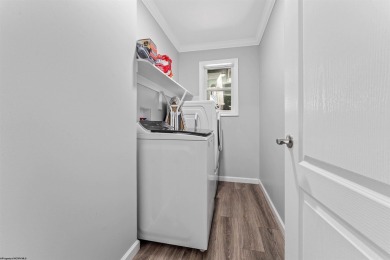 Tucked away on a private road, this gorgeous home offers the