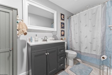 Tucked away on a private road, this gorgeous home offers the