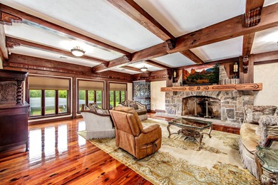 Welcome to a one-of-a-kind luxury estate on over 10 pristine