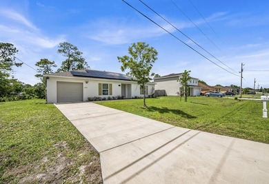 Welcome to this beautifully maintained 2023 built home located - photo 3