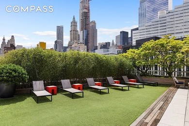 Perched on the 21st floor of the highly sought-after 200 - photo 12