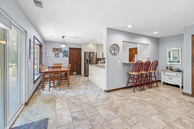 Nestled on over an acre of waterfront property in the desirable - photo 6