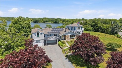 This beautiful, expansive, water front, custom built home with - photo 1