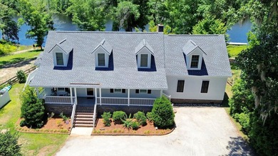 Nestled along the banks of the Black River, discover 203 Cree - photo 2