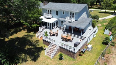 Nestled along the banks of the Black River, discover 203 Cree - photo 5