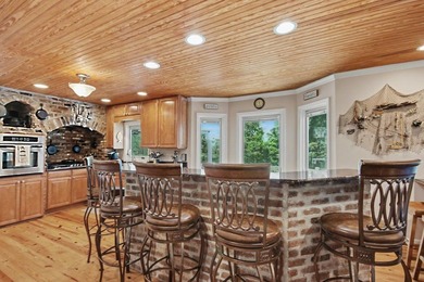 Nestled along the banks of the Black River, discover 203 Cree - photo 10