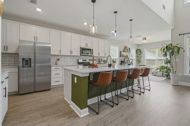 Welcome to Harborview, where coastal charm meets modern comfort - photo 8