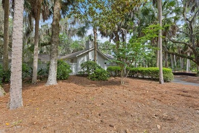 Nestled on a quiet cul-de-sac within the exclusive gated - photo 1