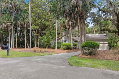 Nestled on a quiet cul-de-sac within the exclusive gated - photo 2