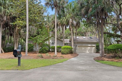 Nestled on a quiet cul-de-sac within the exclusive gated - photo 3