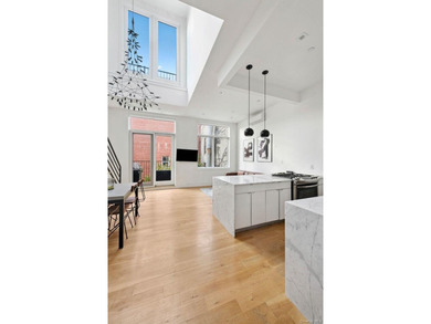 Sun-Drenched Duplex Living with Three Private Outdoor Spaces - photo 2