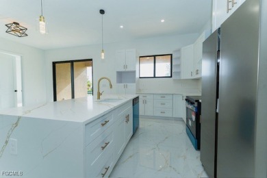 Stunning New construction home on Freshwater canal. This - photo 14
