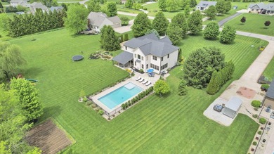 1.35-acre estate,framed by a dense, private wall of mature trees - photo 3