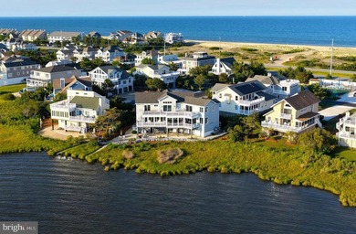 Perfectly positioned along the bay just moments from the beaches - photo 1