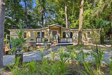 Welcome home to your little piece of paradise East of 17! Just - photo 2