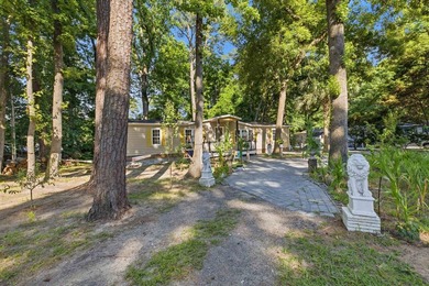 Welcome home to your little piece of paradise East of 17! Just - photo 3