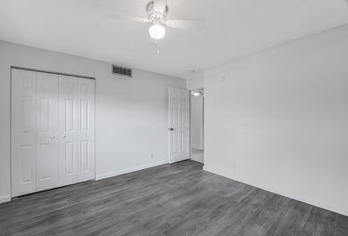 Welcome to this newly renovated, move-in-ready first-floor condo - photo 26