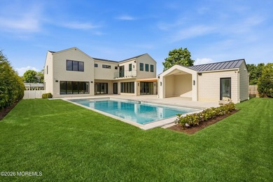Stunning custom new construction offering over 6,000 sq ft of - photo 1