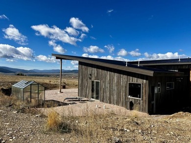This custom 2024 mountain contemporary home sits on 20 acres - photo 4