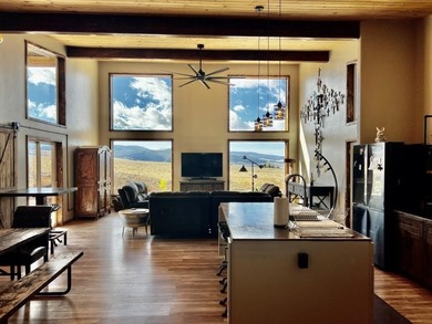 This custom 2024 mountain contemporary home sits on 20 acres - photo 10
