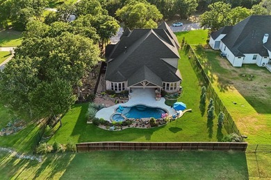 Nestled on nearly an acre lot in the prestigious Gates at Waters - photo 4