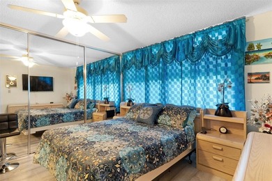 Beautifully updated top floor condo in the 55+ community of Palm