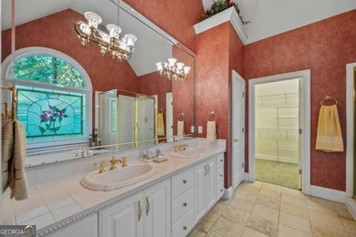 Welcome to this exceptional custom-built home in the prestigious - photo 16