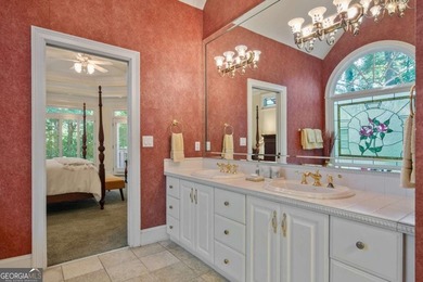 Welcome to this exceptional custom-built home in the prestigious - photo 17