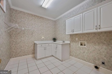 Welcome to this exceptional custom-built home in the prestigious - photo 31