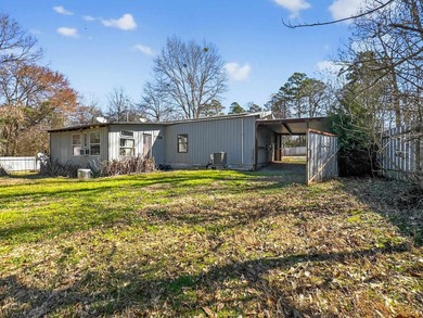 Located in Pine Harbor near Lake O' the Pines, this single-story - photo 33