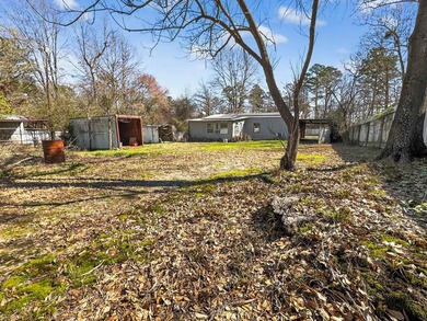 Located in Pine Harbor near Lake O' the Pines, this single-story - photo 34