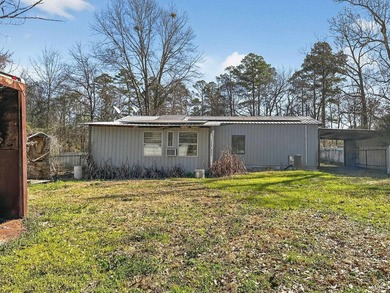Located in Pine Harbor near Lake O' the Pines, this single-story - photo 35