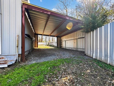 Located in Pine Harbor near Lake O' the Pines, this single-story - photo 37
