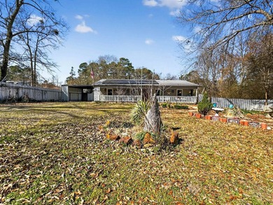 Located in Pine Harbor near Lake O' the Pines, this single-story - photo 40