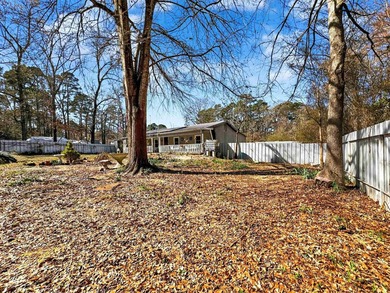 Located in Pine Harbor near Lake O' the Pines, this single-story - photo 41