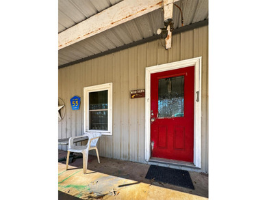 Located in Pine Harbor near Lake O' the Pines, this single-story - photo 45