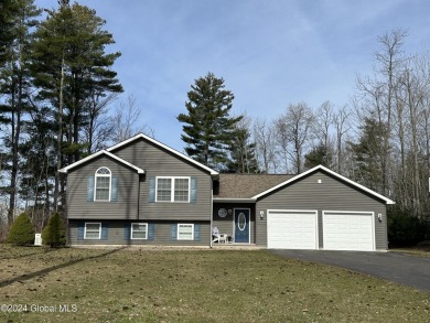 Beautiful split level home. Upon entry you 
will be greeted - Lake Home Sale Pending in Perth, New York