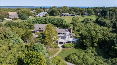 Tucked away on nearly three private acres just moments from the - photo 3