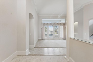 Experience exceptional lakefront living in this custom-built - photo 7