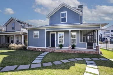 Charming and fresh, this Porches of Rockwater home is located - photo 1