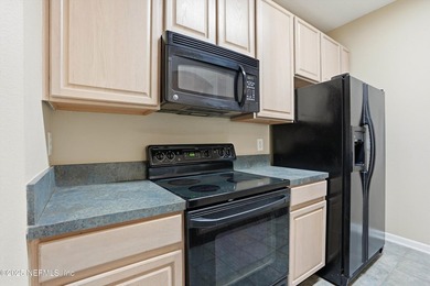 Soaring ceilings enhance the spacious layout with an open - photo 11