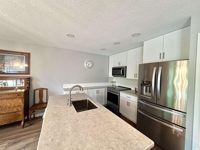 Welcome to this stunningly updated condominium in the desirable - photo 10