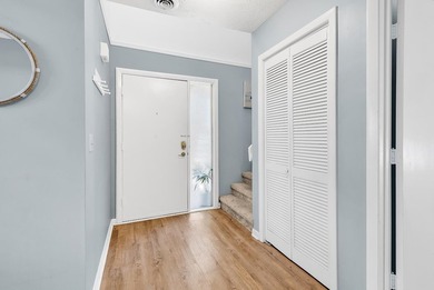 Exceptional marsh-front views, a spacious two-story layout, and - photo 3