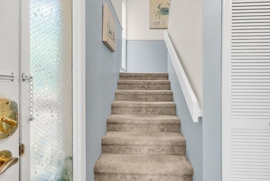Exceptional marsh-front views, a spacious two-story layout, and - photo 4