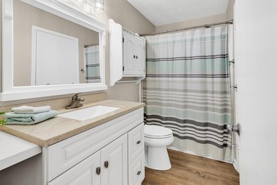 Exceptional marsh-front views, a spacious two-story layout, and - photo 6