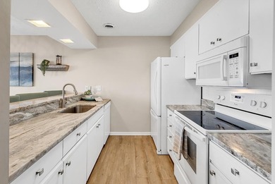 Exceptional marsh-front views, a spacious two-story layout, and - photo 7