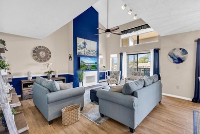 Exceptional marsh-front views, a spacious two-story layout, and - photo 9