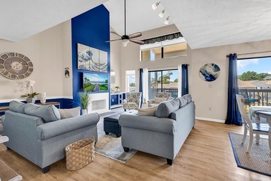 Exceptional marsh-front views, a spacious two-story layout, and - photo 10