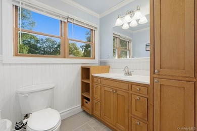 Welcome to this charming 4-bedroom, 2-bath home nestled in the - photo 8