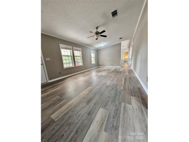 Looking for a little extra space? This inviting 3BR/2BA home in - photo 3